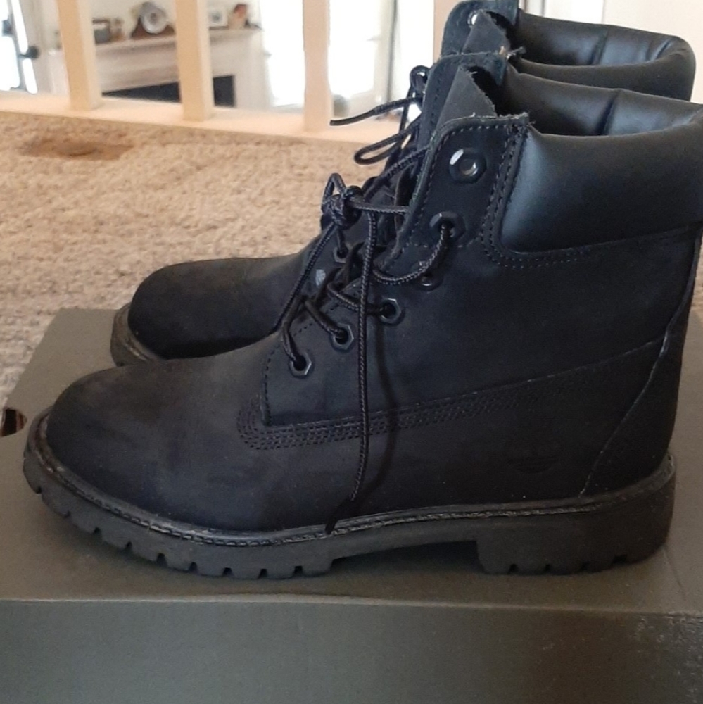SOLD. Black Tims.
